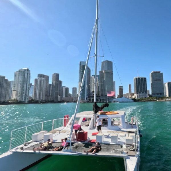 a boat is docked next to a body of water