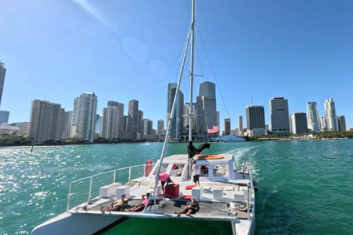 a boat is docked next to a body of water