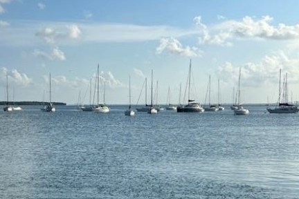 a small boat in a large body of water